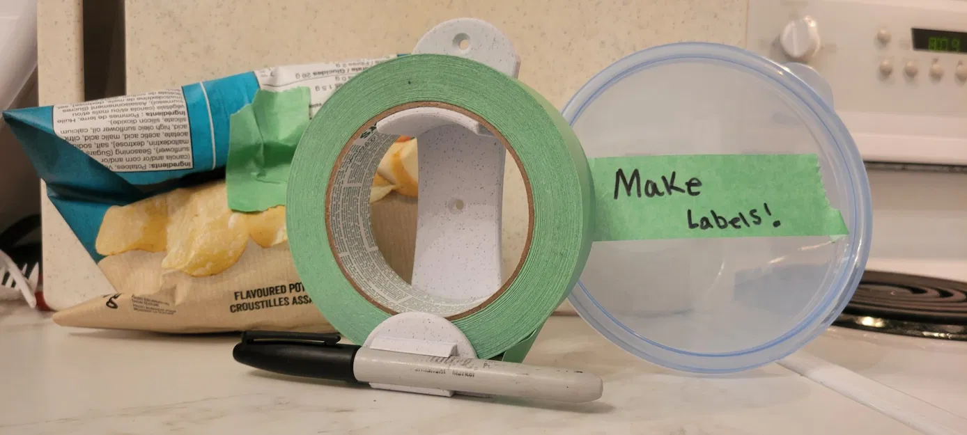 Giá đỡ băng dính treo tường với chỗ để bút đánh dấu - Image 1