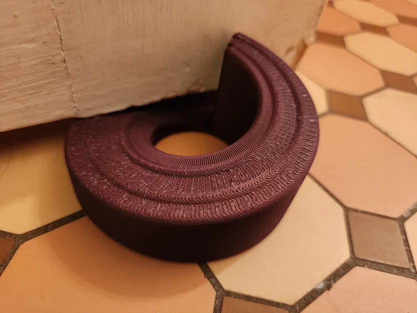 Đồ chặn cửa thiết kế hình xoắn ốc tiết kiệm không gian - Image 1