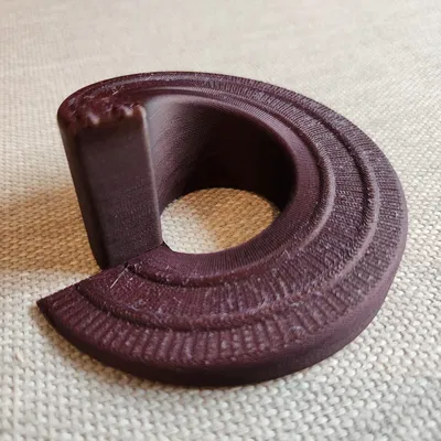 Đồ chặn cửa thiết kế hình xoắn ốc tiết kiệm không gian