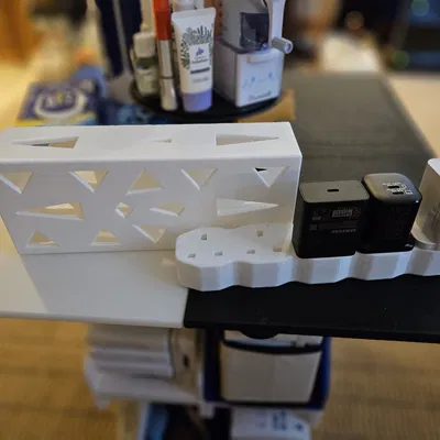 Giá đỡ cho bộ sạc điện thoại tại Anh