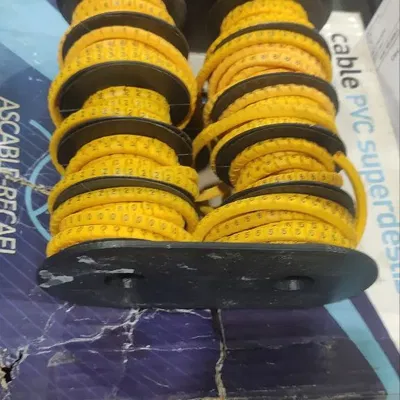 Giá đỡ cuộn nhãn dây cáp tổ chức gọn gàng