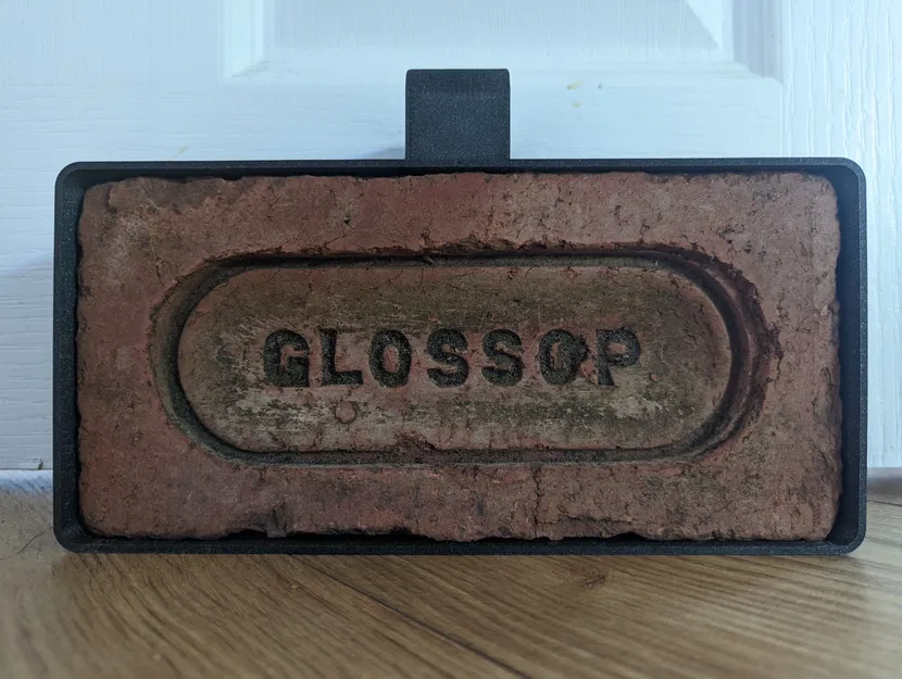 Chặn cửa bằng gạch tái chế có tay cầm dễ di chuyển - Image 1