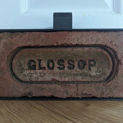 Chặn cửa bằng gạch tái chế có tay cầm dễ di chuyển