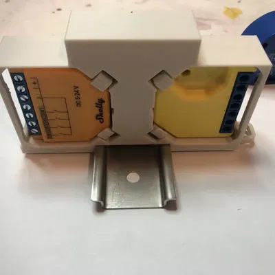 Giá đỡ shelly đôi cho mô-đun din đơn