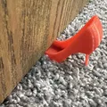 Giày chặn cửa hình dáng độc đáo từ DoorStop - Thumbnail 1
