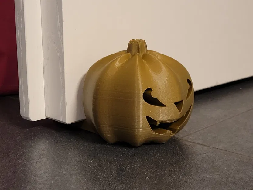 Bình giữ cửa hình bí ngô với mặt Halloween - Image 1