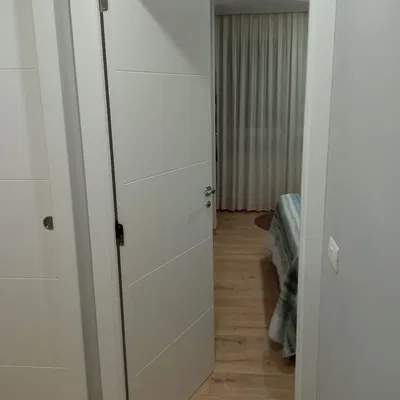 Bộ chặn cửa treo từ bản lề