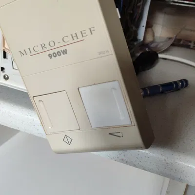 Thay thế nút mở cửa lò vi sóng Micro-Chef 900W 2935n