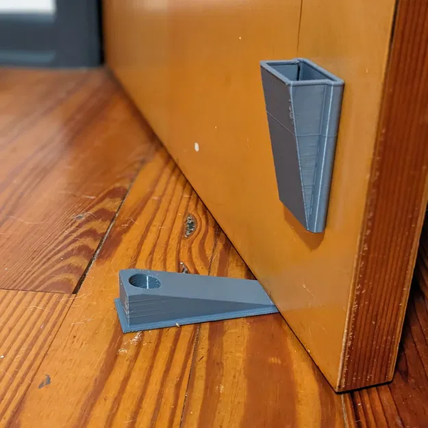 Cái chặn cửa hình nêm với giá đỡ tiện lợi - Image 1