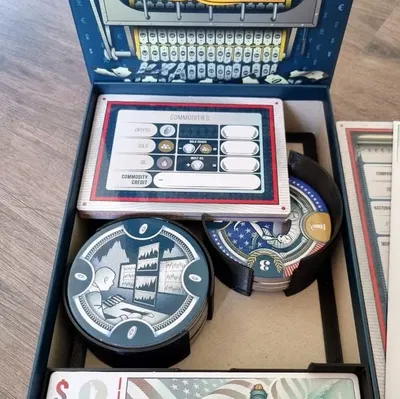 Tổ chức trò chơi Q.E. và mở rộng Commodities