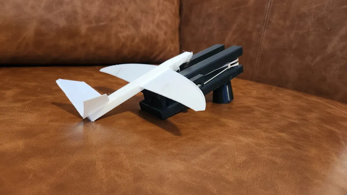 Tàu lượn có bệ phóng cầm tay in liền - Image 1