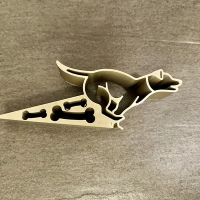 Đế chặn cửa hình chó chạy ngoài trời