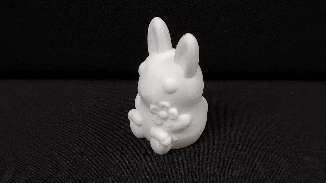 Thỏ cầm hoa trang trí cho mùa xuân và lễ Phục Sinh - Image 1