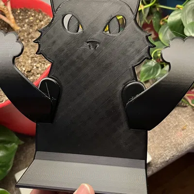 Giá đỡ cửa hình mèo đáng yêu treo tường