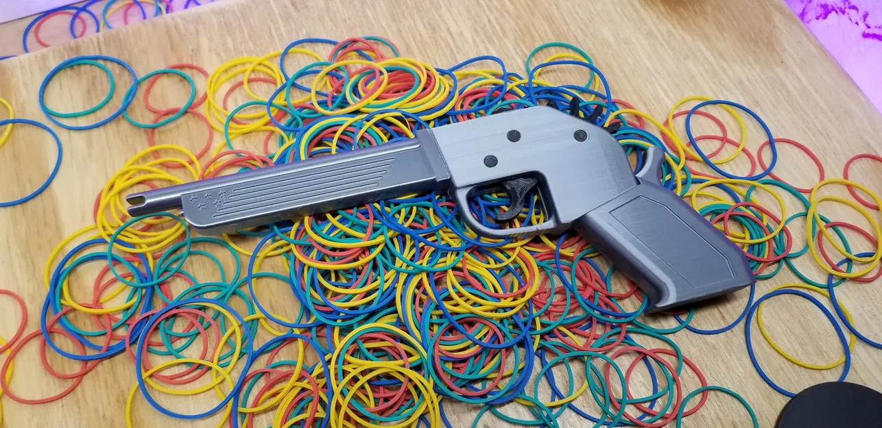 Súng Cao Su Bán Tự Động - In Toàn Bộ - Image 1