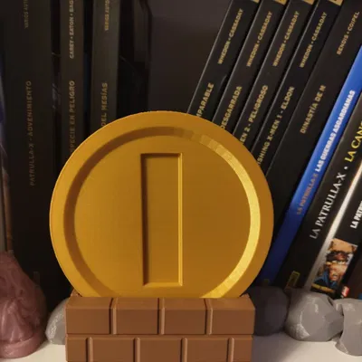 Đồng xu Super Mario Bros. với giá đỡ hình hộp gạch