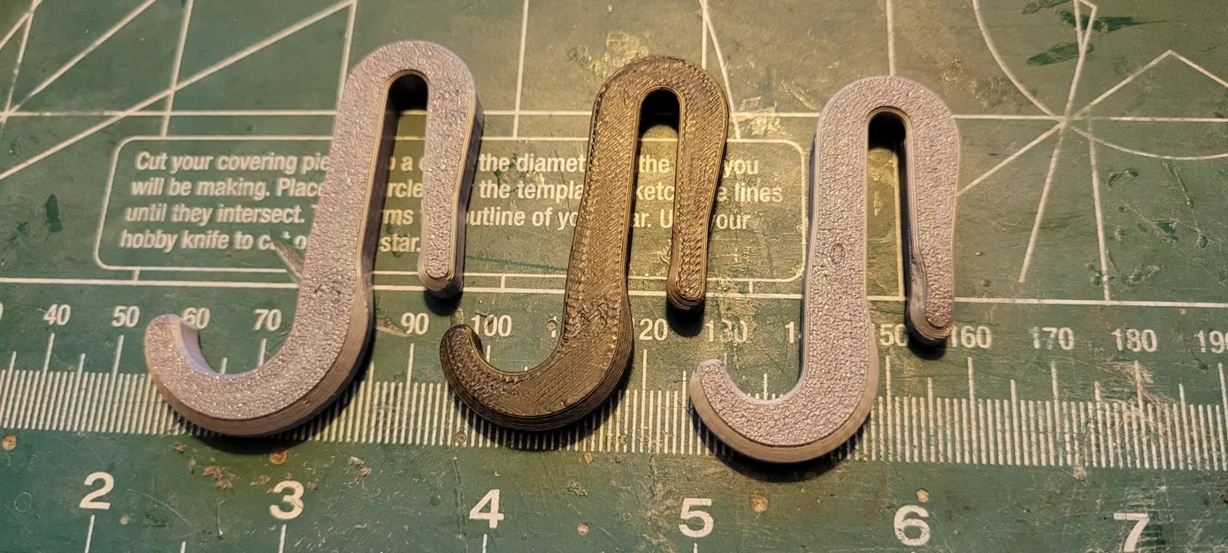 Móc treo kệ dây cho ô tô điều khiển từ xa - Image 1