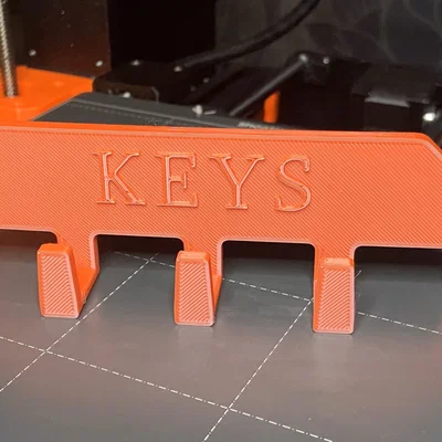 Móc treo chìa khóa với chữ "Chìa khóa