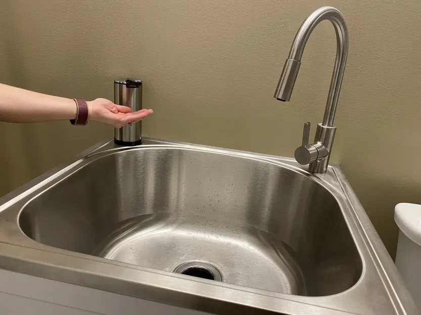 Giá đỡ cho máy phân phối xà phòng lắp qua lỗ chậu giặt - Image 1