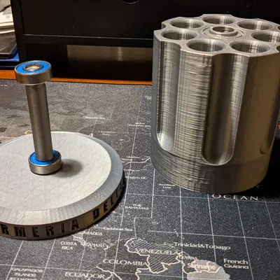 Giá đỡ bút xoay hình súng lục