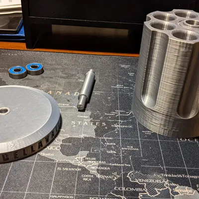 Giá đỡ bút xoay hình súng lục