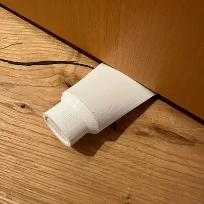 Đế giữ cửa hình ống tiện lợi cho gia đình