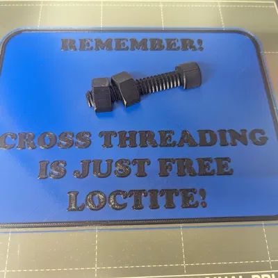 Biển báo "Vít chéo chỉ là Loctite miễn phí!