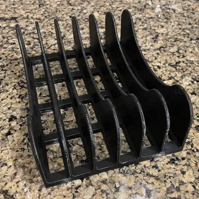 Giá đỡ cho nắp hộp nhựa trong bếp