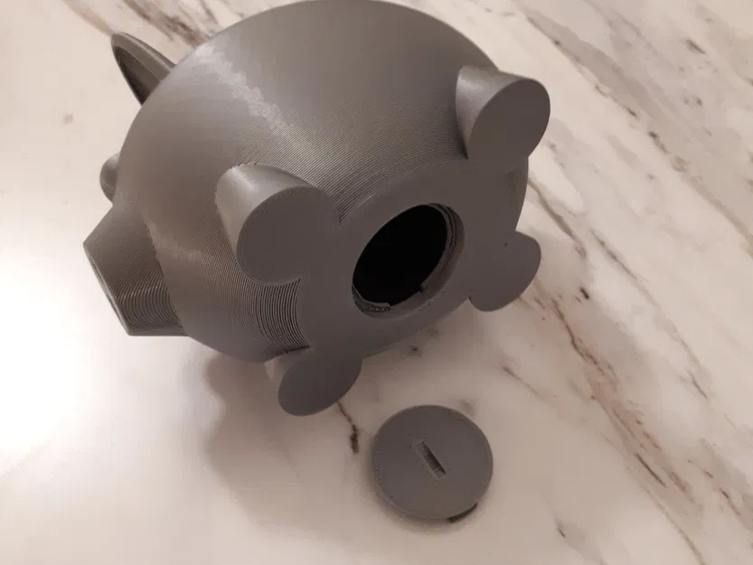 Con heo đất với nút chặn tiện lợi - Image 1