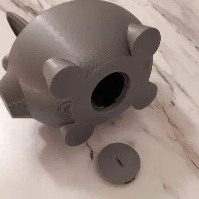 Con heo đất với nút chặn tiện lợi