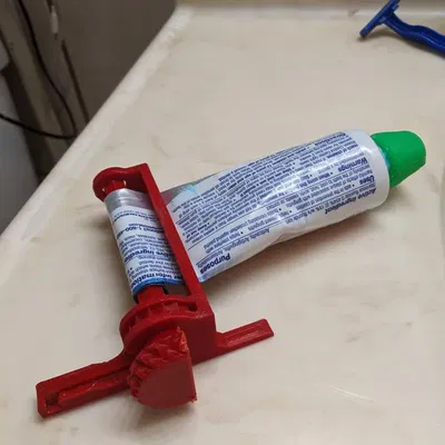 Bộ ép kem đánh răng với cơ chế ratchet đơn giản