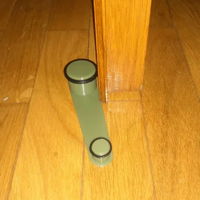 Tope cửa giữ mở cho cửa xoay