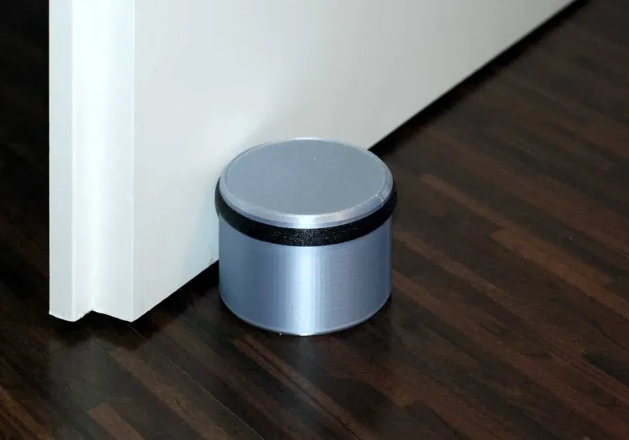 Chặn cửa hình trụ đổ đầy sỏi để tăng trọng lượng và ... - Image 1