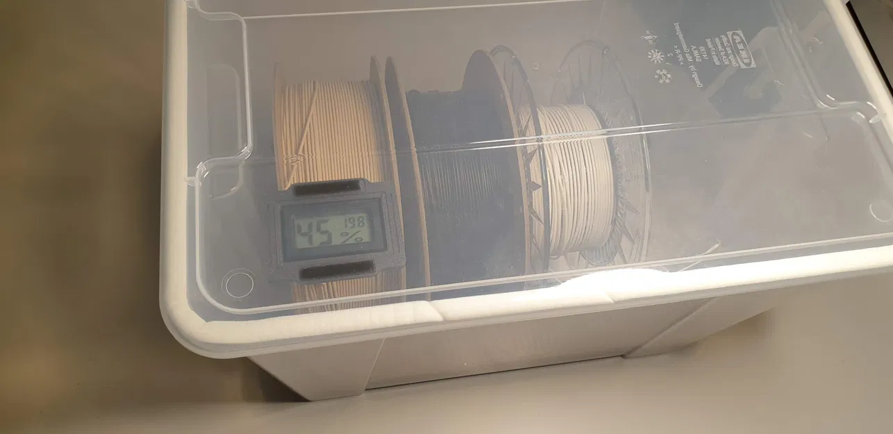 Giá đỡ đồng hồ đo độ ẩm/nhiệt độ cho hộp lưu trữ khô - Image 1