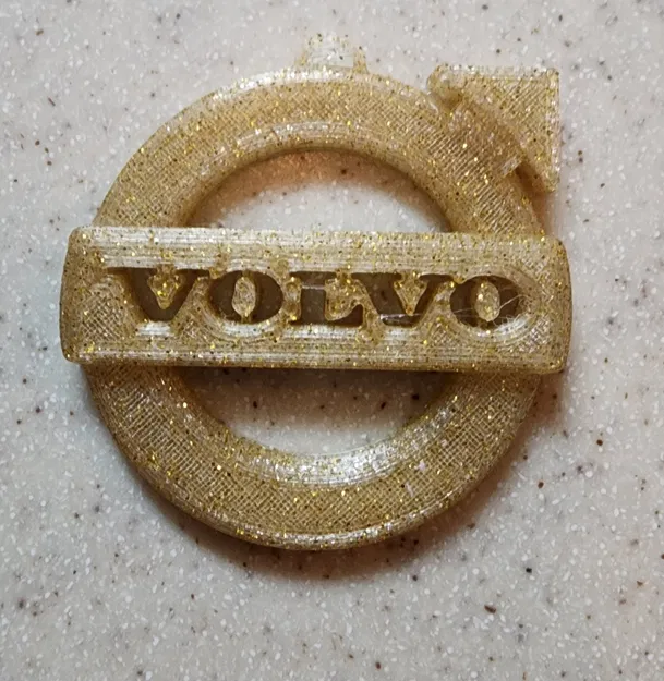 Biểu tượng xe hơi Volvo dùng làm móc chìa khóa hoặc trang trí - Image 1