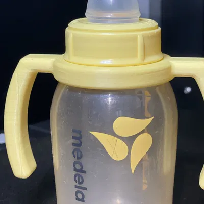 Cán cầm cho bình sữa Medela dành cho trẻ nhỏ