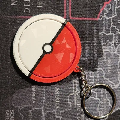 Móc khóa Pokeball xoay nhiều màu sắc in tại chỗ