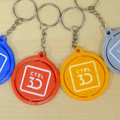 Móc khóa xoay đa màu sắc với logo Control3D