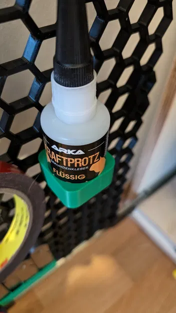 Giá đỡ tổ ong cho chai keo dán - Image 1