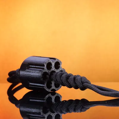 Biểu tượng viên đạn revolver cho dây đeo và móc chìa khóa