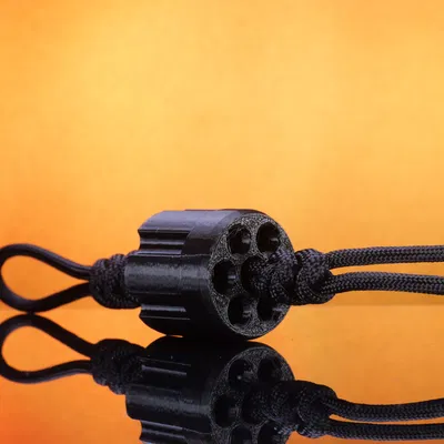 Biểu tượng viên đạn revolver cho dây đeo và móc chìa khóa