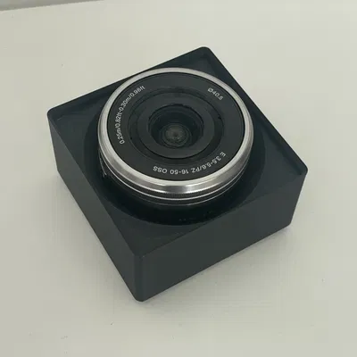 Hộp chứa ống kính Sony e-Mount với nắp ống kính tháo rời