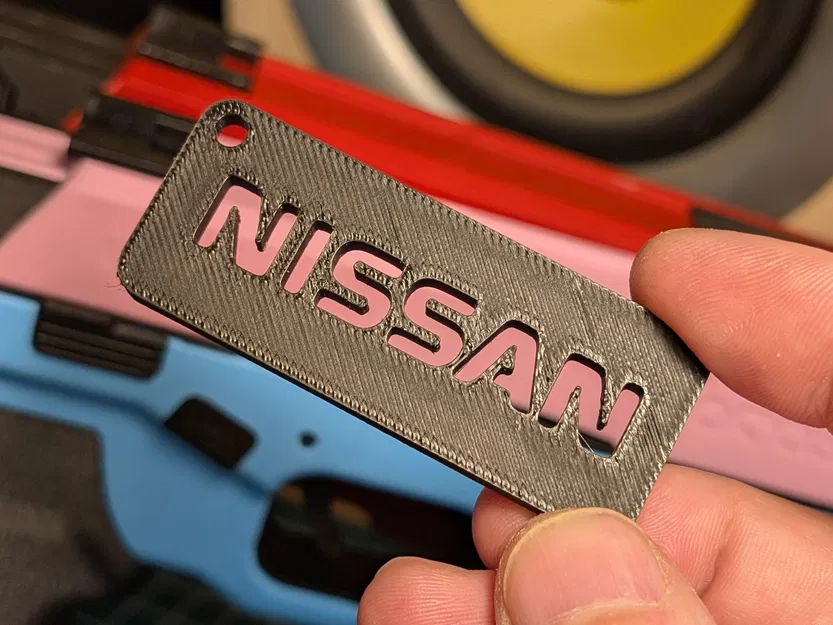 Móc khóa Nissan thiết kế tối giản cho người yêu xe hơi - Image 1