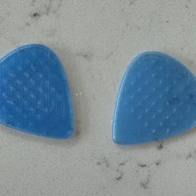 Guitar Pick với thiết kế tay cầm từ súng Sig Saur