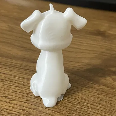 Mô hình chó ngồi chuẩn bị sơn tay