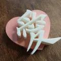 Biểu tượng Kanji "Yêu" dưới dạng tác phẩm điêu khắc chữ v... - Thumbnail 1