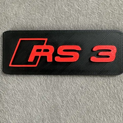 Biểu tượng Audi RS3 gắn trên cản trước xe ô tô