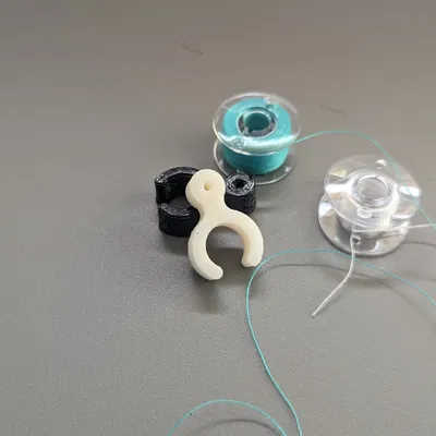 Kẹp giữ chỉ cho cuộn bobbin