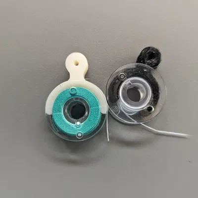 Kẹp giữ chỉ cho cuộn bobbin