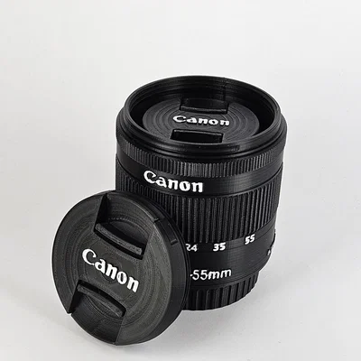 Hộp đựng ống kính Canon EF-S 18-55mm và giá đỡ bút